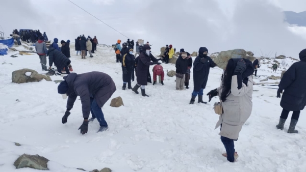 Tourists enjoy the snow in Gulmarg, the world-famous tourist destination in north Kashmir, following the season’s first snowfall.