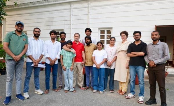 Leader of the Opposition in the Lok Sabha Rahul Gandhi and Congress General Secretary Priyanka Gandhi Vadra interact with students of Vision IAS coaching institute in New Delhi on Wednesday.