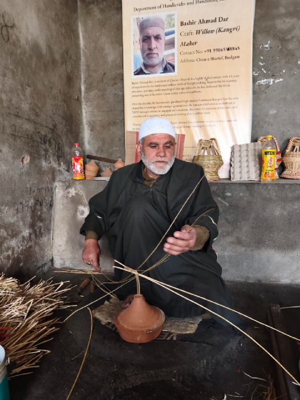 Ghulam Hassan Khadim, a kangri maker, at his workshop in Charar-i-Sharief.