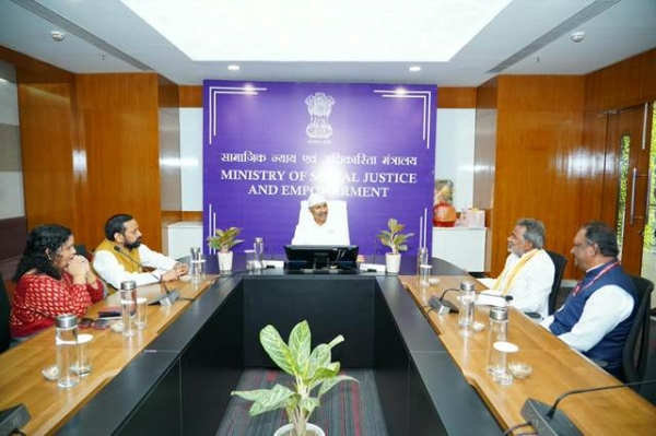 Union Minister for Social Justice and Empowerment Dr. Virendra Kumar, accompanied by other dignitaries, at the event.