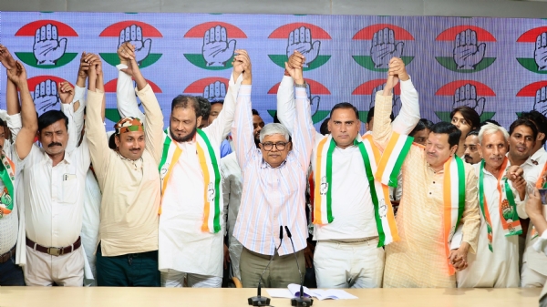 Former Bahraich chairman Haji Rehan Khan and Ramveer Chaudhary of Mathura after joining the Congress at the party headquarters in New Delhi.