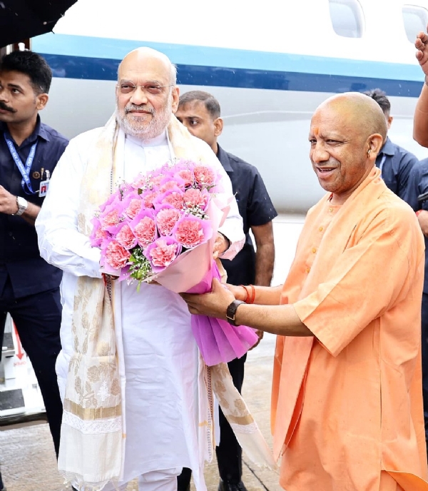 UP CM greeted HM Amit Shah at the airport
