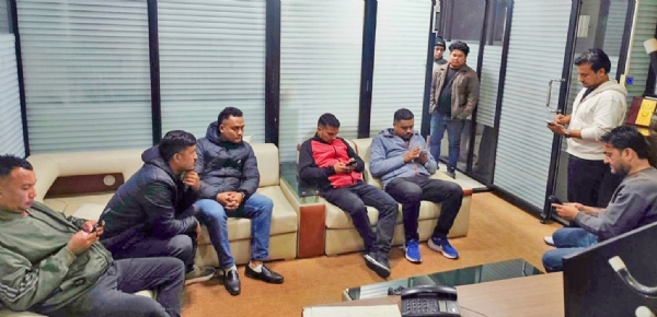 Police personnel in plain clothes stationed inside a media organisation in Kathmandu.