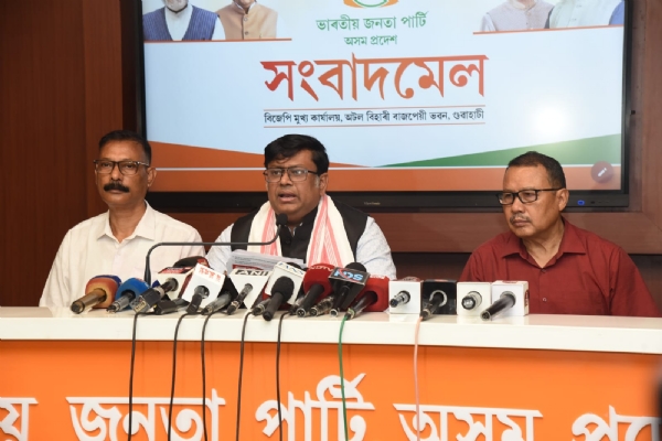 Image of the press conference at the Assam BJP headquarters.