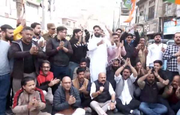 BJP Yuva Morcha Protests In Jammu, Seeks Rahul’s Apology For ‘Shirtless Protest’ At AI Summit BJP Yuva Morcha Protests In Jammu, Seeks Rahul’s Apology For ‘Shirtless Protest’ At AI Summit