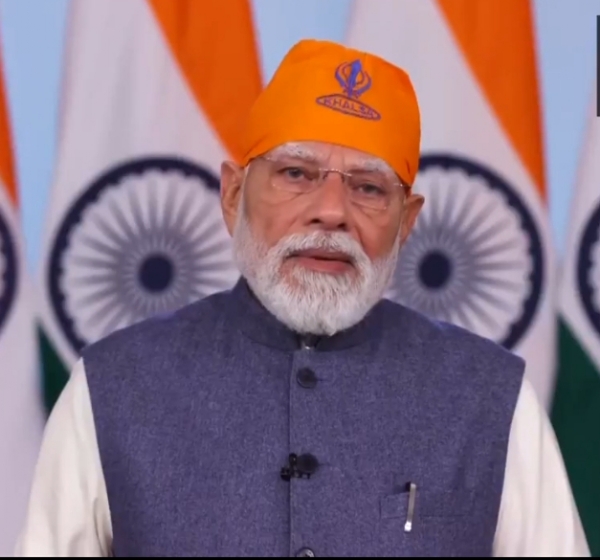 Prime Minister Narendra Modi addressing the program.