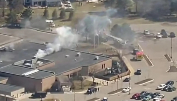 Smoke rising from Temple Israel in West Bloomfield, Michigan. Photo: CBS News