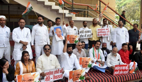 City and District Congress Committee members staged a protest at Vikas Bhawan on Tuesday