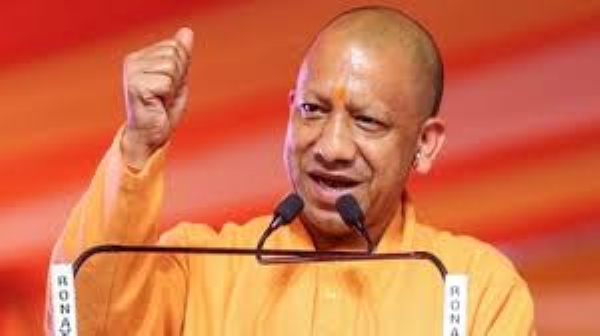 Yogi addressing at an event called Navnirman Ke 9 Varsh (9 Years of Reform)