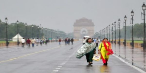 Delhi-NCR Revels in Rain-Cooled Breeze as AQI Improves Amid Yellow Alert