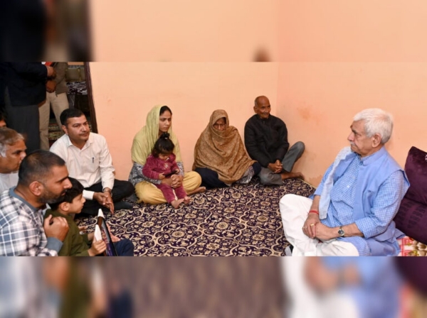LG Sinha Visits Family Of SSF Personnel Killed In Road Accident