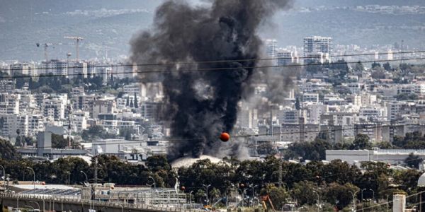 Iran Hezbollah Barrage Ignites Haifa Oil Refinery Sparking Fears of Wider Escalation
