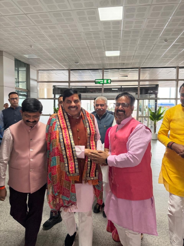 MP CM arrives at Varanasi airport