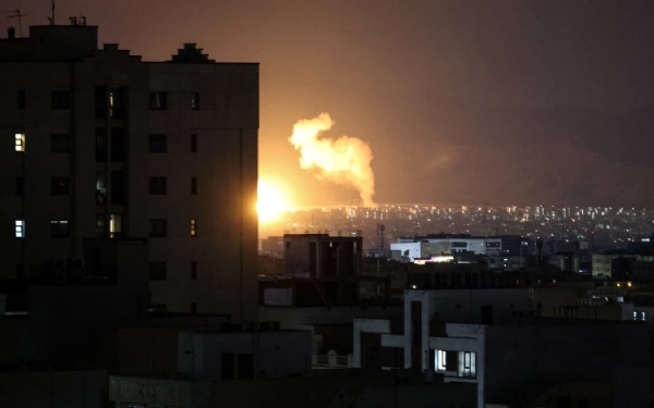 Smoke rises following airstrikes in a central area of the Iranian capital Tehran on Friday(March 6,2026)