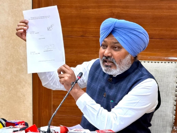 Cabinet Minister Harpal Singh Cheema addressing a press conference
