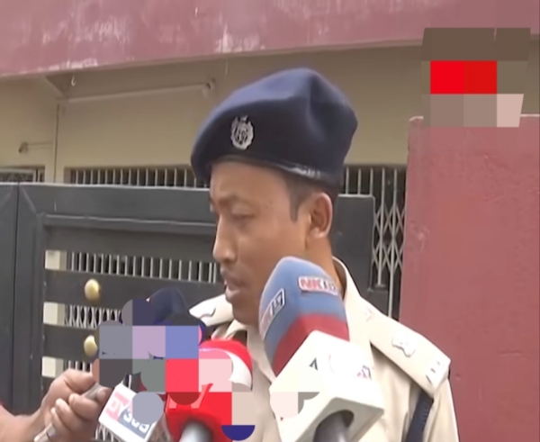 Police Officer Giving bite to Media after theHorrific Night Robbery in Nagaon at Doctors House.