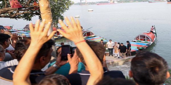 Amid Bengal Poll Battle, PM Modi Takes Boat Ride on Ganga, Hugs Man at Kolkata Ghat