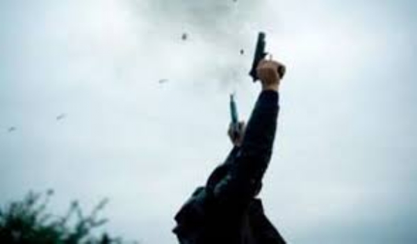 Man arrested over celebratory firing