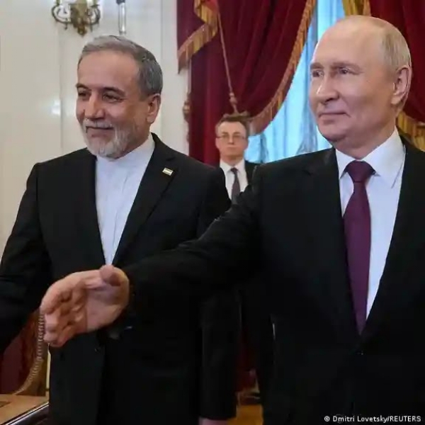 Russian President Vladimir Putin with Iran Foreign Minister Abbas Araghchi
