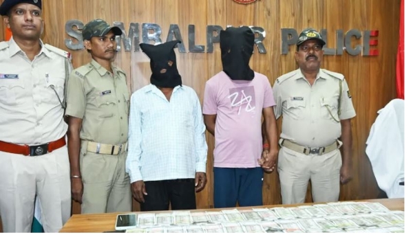 Two Officials Arrested,