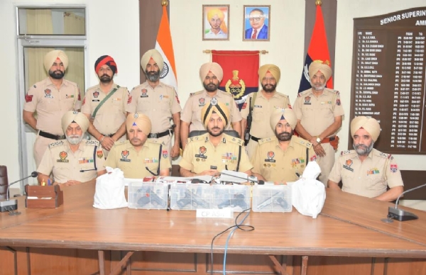 CP Amritsar Gurpreet Singh Bhullar briefing the press conference.