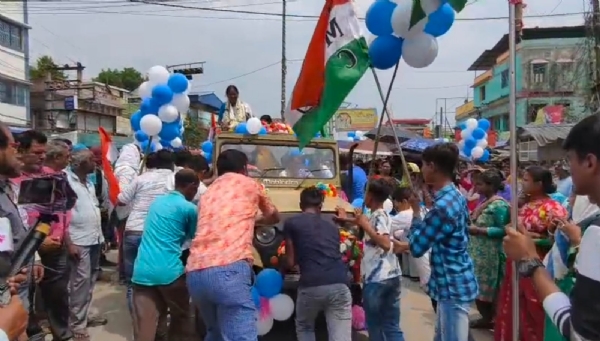 TMC workers pushing the car
