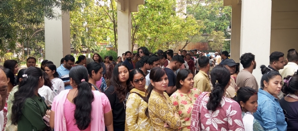 People standing in queue for voting in Guwahati. People standing in queue for voting in Guwahati.