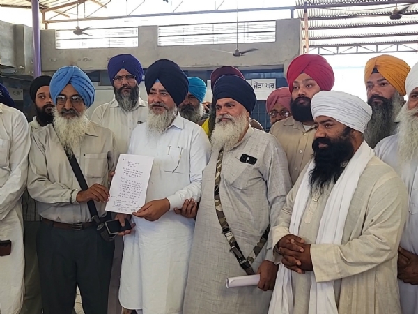 village people giving written complaint to police.