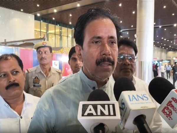 Minister Anil Rajbhar speaking to reporters on Sunday