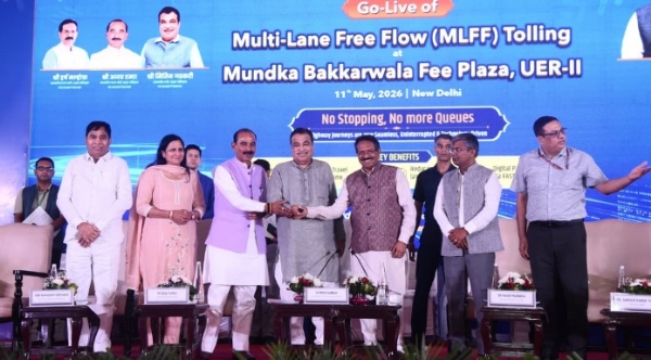 Union Minister Nitin Gadkari inaugurating the Multi‑Lane Free Flow barrier‑less tolling system at the Mundka–Bakkarwala toll plaza in Delhi.