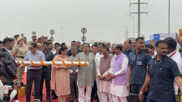 Union Minister Nitin Gadkari inaugurating the Multi‑Lane Free Flow (MLFF) barrier‑less tolling system at the Mundka–Bakkarwala toll plaza on UER‑II in New Delhi. Standing alongside him are Union Minister of State Harsh Malhotra, Union Minister of State Ajay Tamta, MPs Kamaljeet Sahrawat and Yogendra Chandolia, and NHAI Chairman Santosh Kumar Yadav.