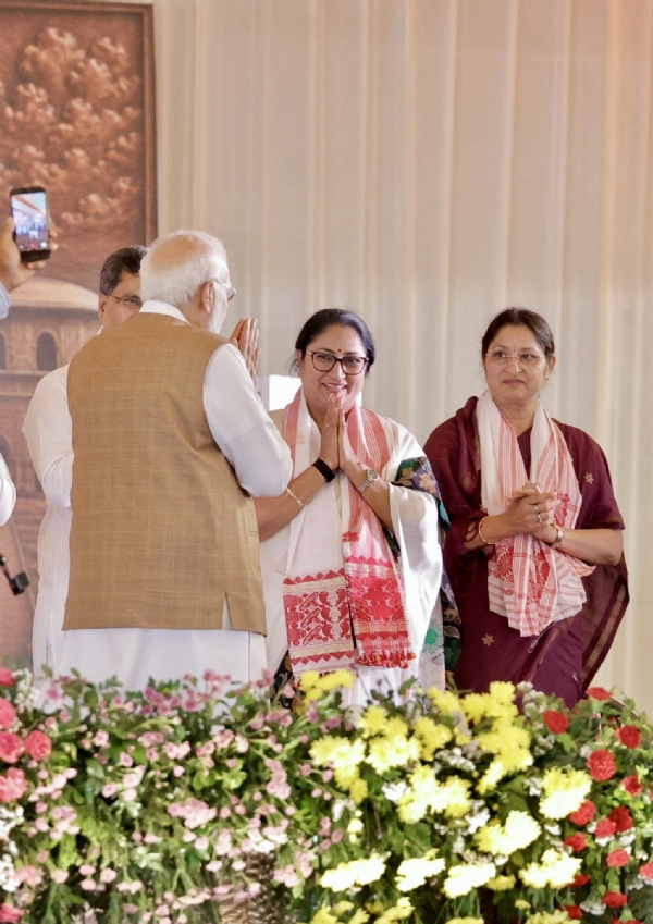 Delhi Chief Minister Rekha Gupta greeting Prime Minister Narendra Modi during the government’s swearing‑in ceremony held in Guwahati on Tuesday.