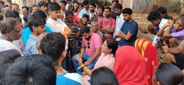 BJP councillor meeting with sanitation workers