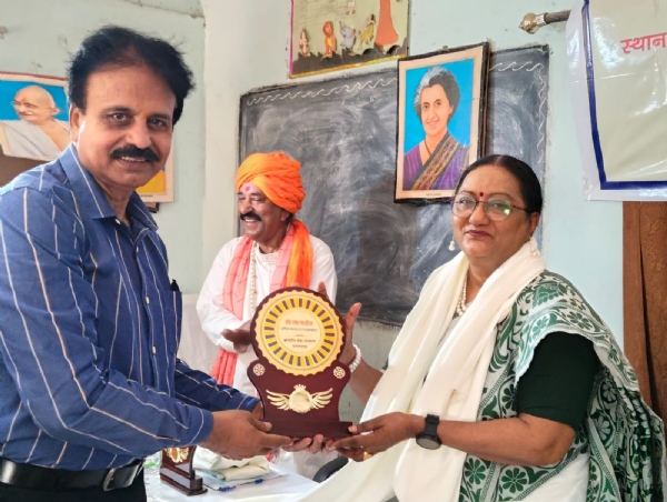 Dr. Rama Montrose  honored with shawls and mementos