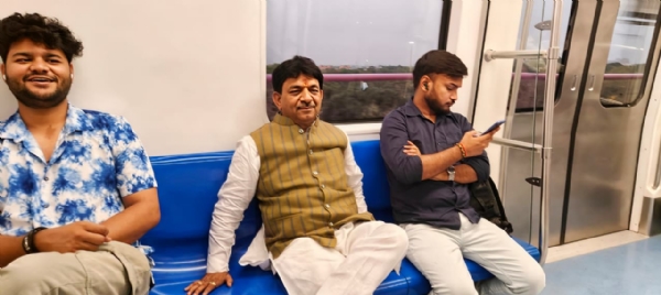 Minister Kapil Dev Agarwal commutes by Metro