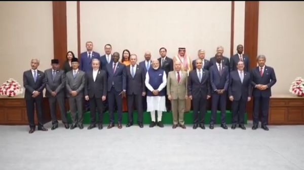 Prime Minister Narendra Modi is present along with others.