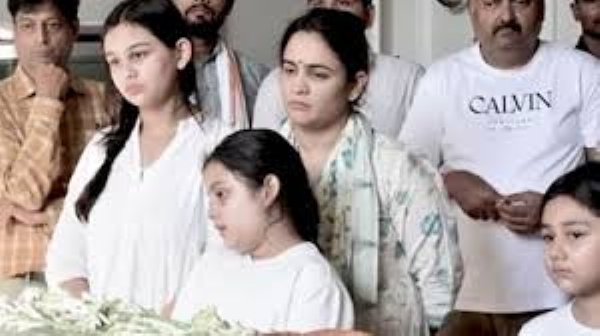 2 daughters paid their last respects and farewell