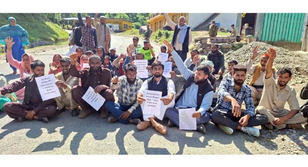 People protest over pending road, JJM works in Budhal