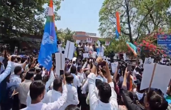 NSUI staging a protest over the NEET question paper leak case.