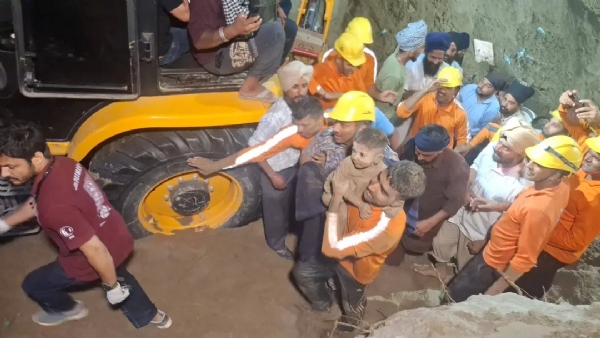 NDRF team taking Gurkaran Singh after rescue