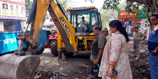 JCB clears years of waste behind Rishra ticket counter