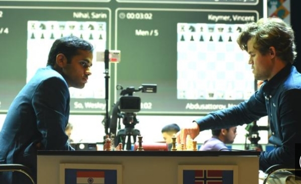 Arjun Erigaisi and Magnus Carlsen