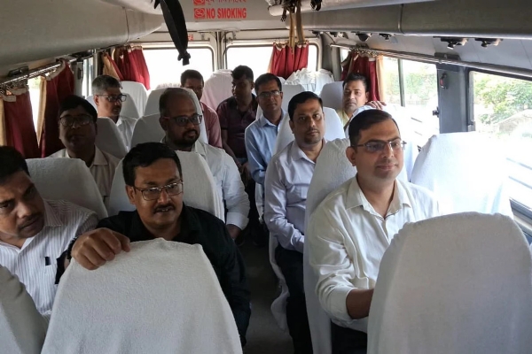 Officials in Bus