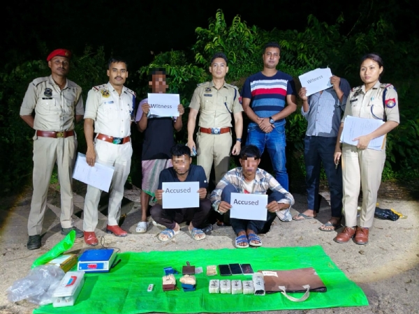 Image of the Seized Narcotics and Arrested Accused. Image of the Seized Narcotics and Arrested Accused.