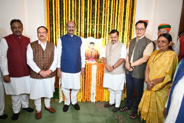 Lok Sabha Speaker Om Birla and Union Ministers paying floral tributes to Vinayak Damodar Savarkar. Lok Sabha Speaker Om Birla and Union Ministers paying floral tributes to Vinayak Damodar Savarkar.