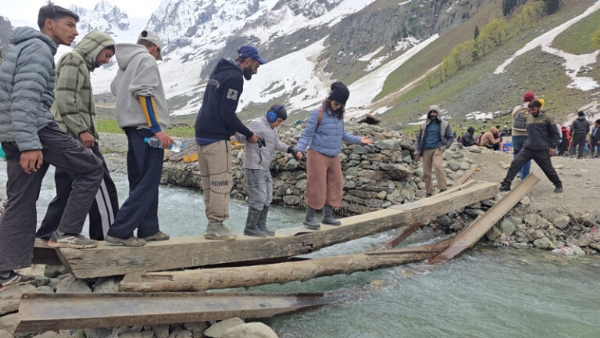 Dilapidated wooden bridge at Thajwas risky