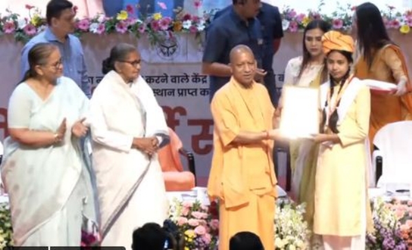 UP CM addressing meritorious students at a ceremony held at Lok Bhavan
