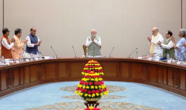 Members of the Union Cabinet give a standing ovation to Prime Minister Narendra Modi during the Cabinet meeting, congratulating and honouring him on the occasion.