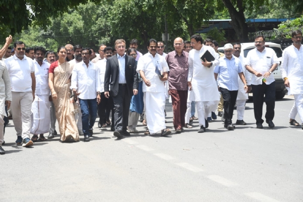The high-level Congress delegation exits after meeting with the Election Commission.