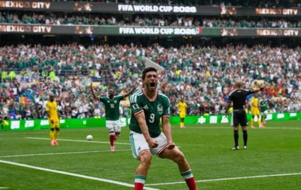 Mexico players celebrate their victory.